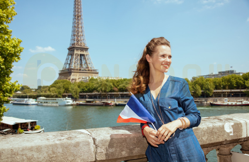 Free Image, Attractive smiling tourist woman with France flag exploring attractions