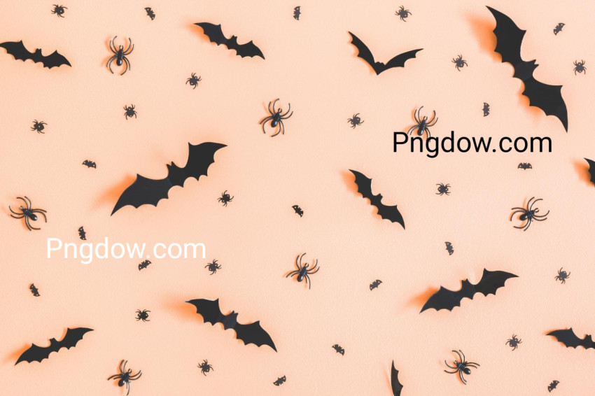 Halloween paper decorations on orange background  Halloween concept  Flat lay, top view