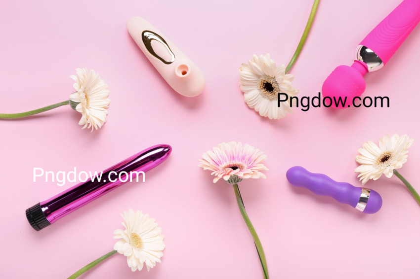 Vibrators with Gerbera Flowers on Pink Background