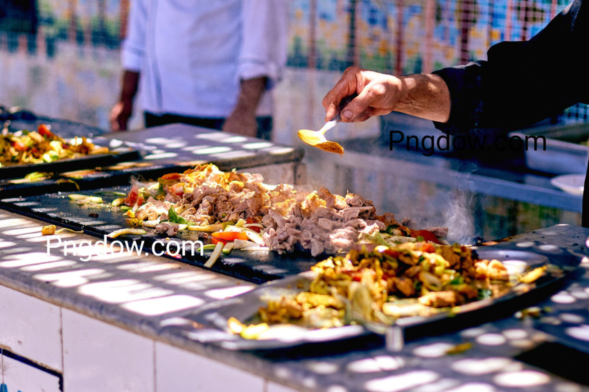 Modern food stylist decorating meal for presentation in restaurant  Closeup of food stylish  Restaurant serving  Close up on the hand of a waiter carrying food,