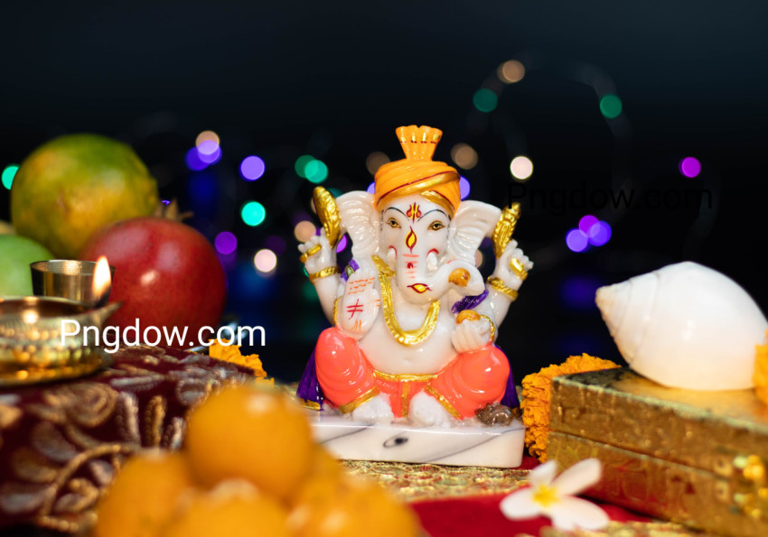Closeup Of Hindu God Ganesha Ganpati Bappa Morya In Sitting Pose On A Colorful Bokeh Effect Black Background  For Prayers On Diwali Puja New Year Deepawali Ganesh Chaturthi Or Shubh Deepavali Pooja