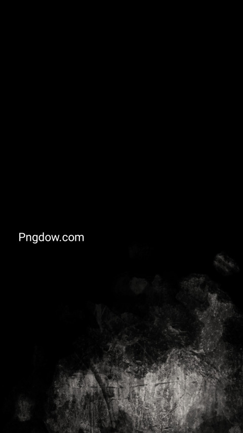 A person standing in the dark against a black wallpaper