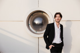 Cool Man in Suit near the Wall